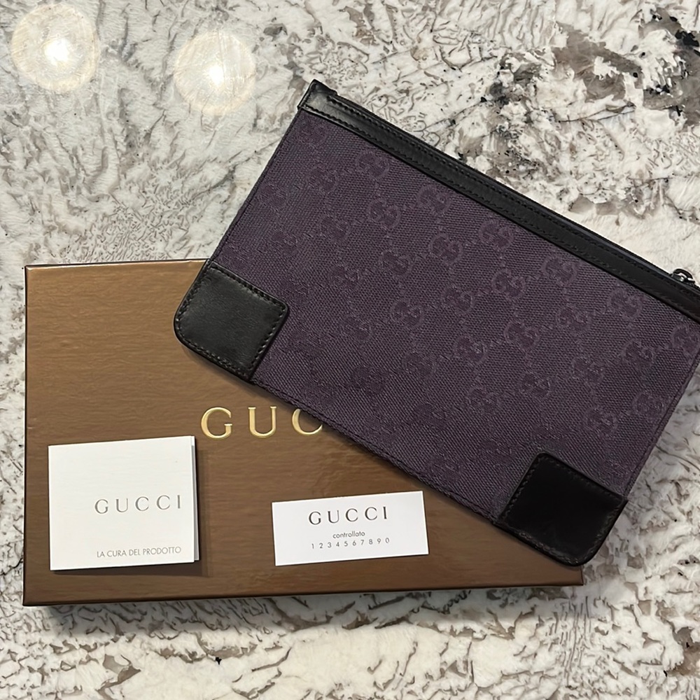 Authentic Gucci Clutch in dark purple canvas with leather accents